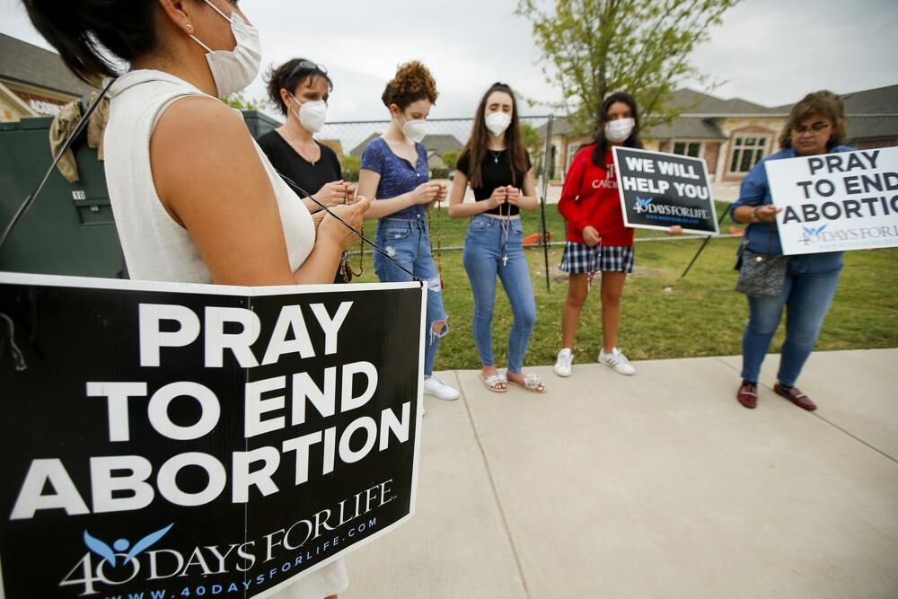 Judge orders Texas to suspend new law banning most abortions